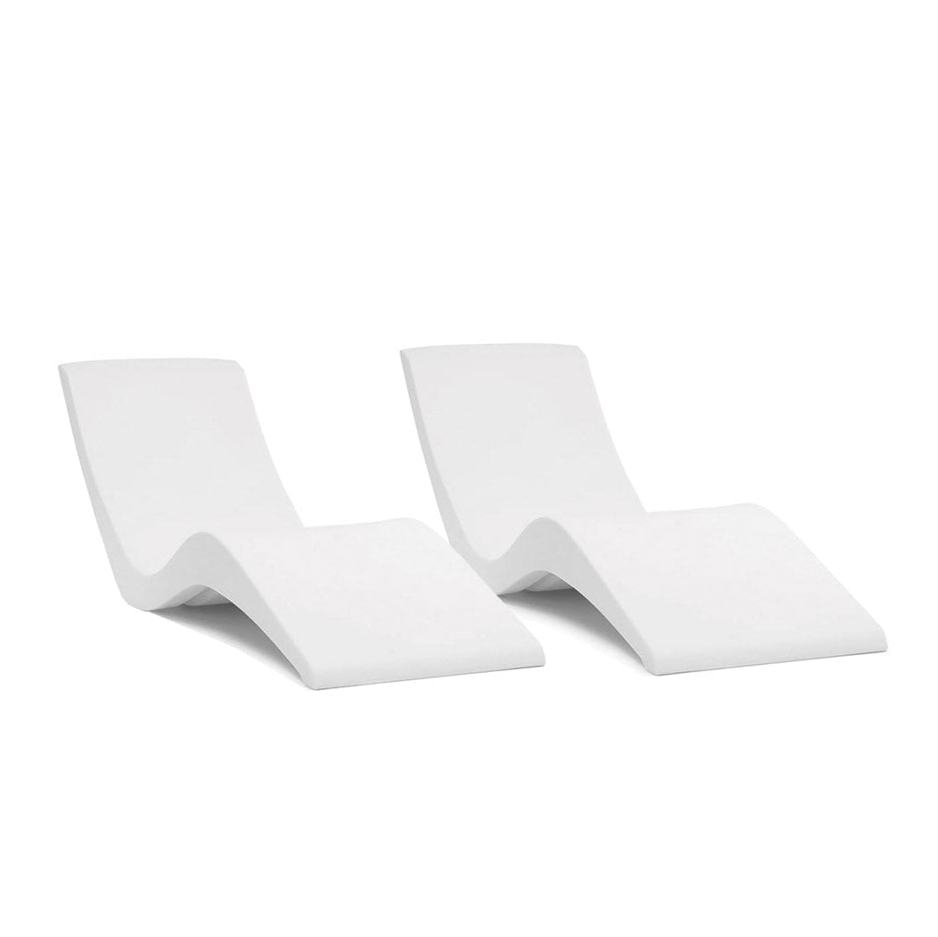 The Aqua Outdoors Chaise Lounge Set features two modern white chairs with smooth, wave-like curves, placed side by side on a plain white background—perfect for relaxing in style at your preferred pool depth.