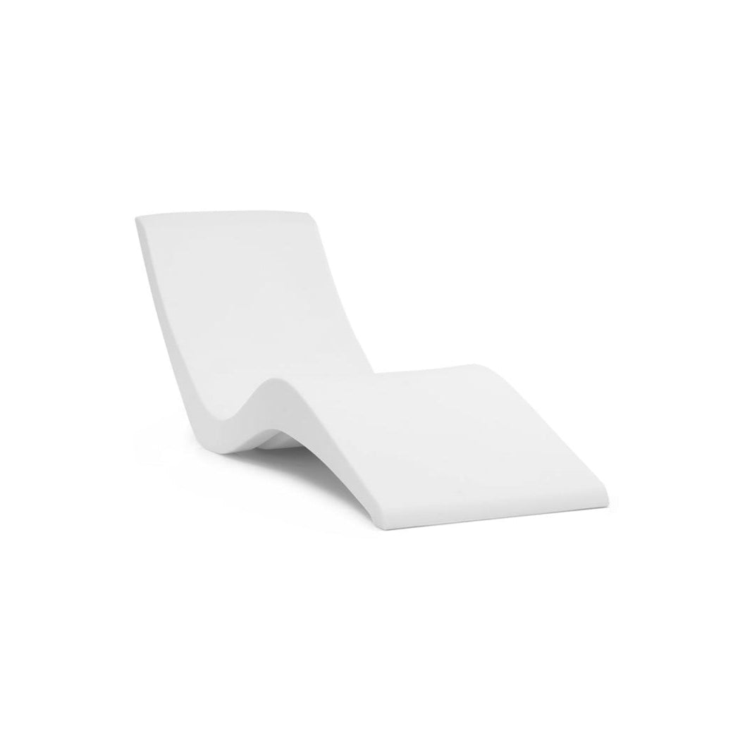 The AquaOutdoors Chaise Pool Lounger is a sleek, modern lounge chair with a curvy design crafted from smooth solid surface material, set against a plain white background.