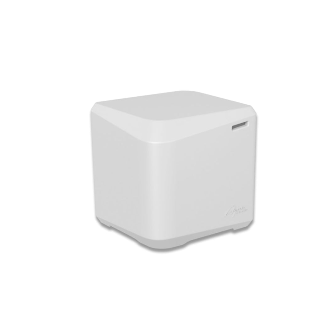 A small, white, cube-shaped wireless router with smooth edges sits on an AquaOutdoors In Pool Table. The device features a subtle logo and a slot near the top corner, blending seamlessly into the minimalistic setting.