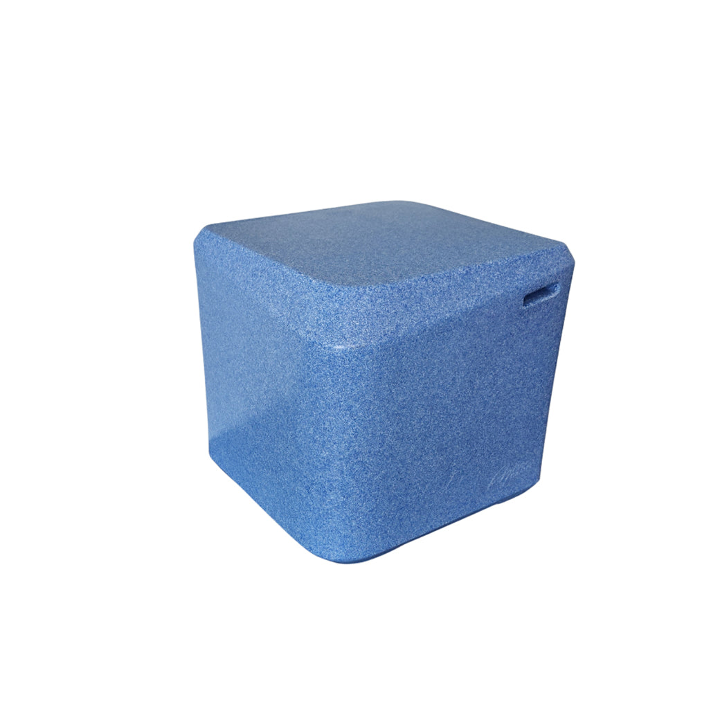 The AquaOutdoors In Pool Table is a blue, cube-shaped foam block with a textured surface and a small handle-like groove on one side, perfect for adding comfort or style to your pool ledge.